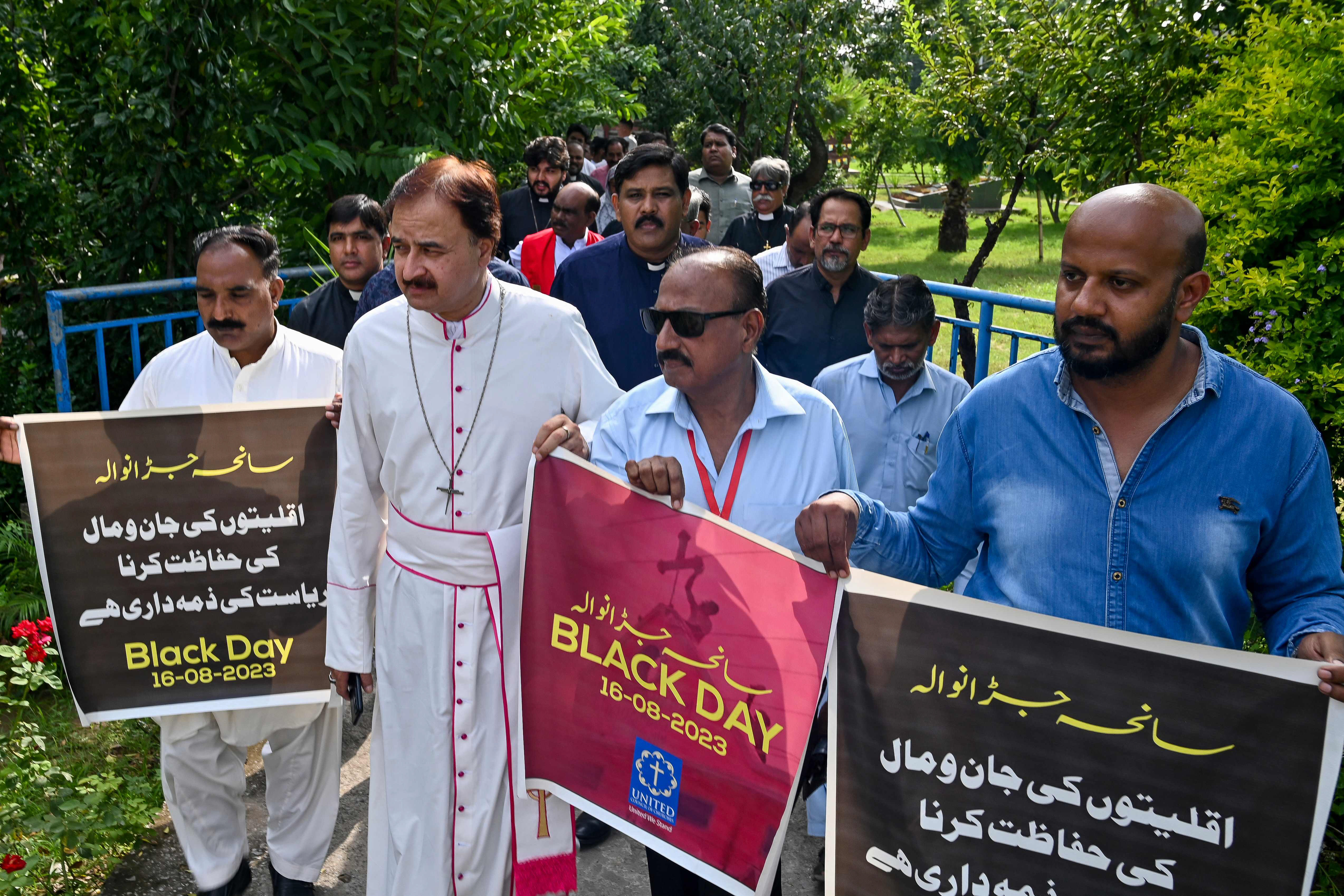 civil society activists and members of the united council of churches hold a protest demonstration against attacks on churches in islamabad photo afp