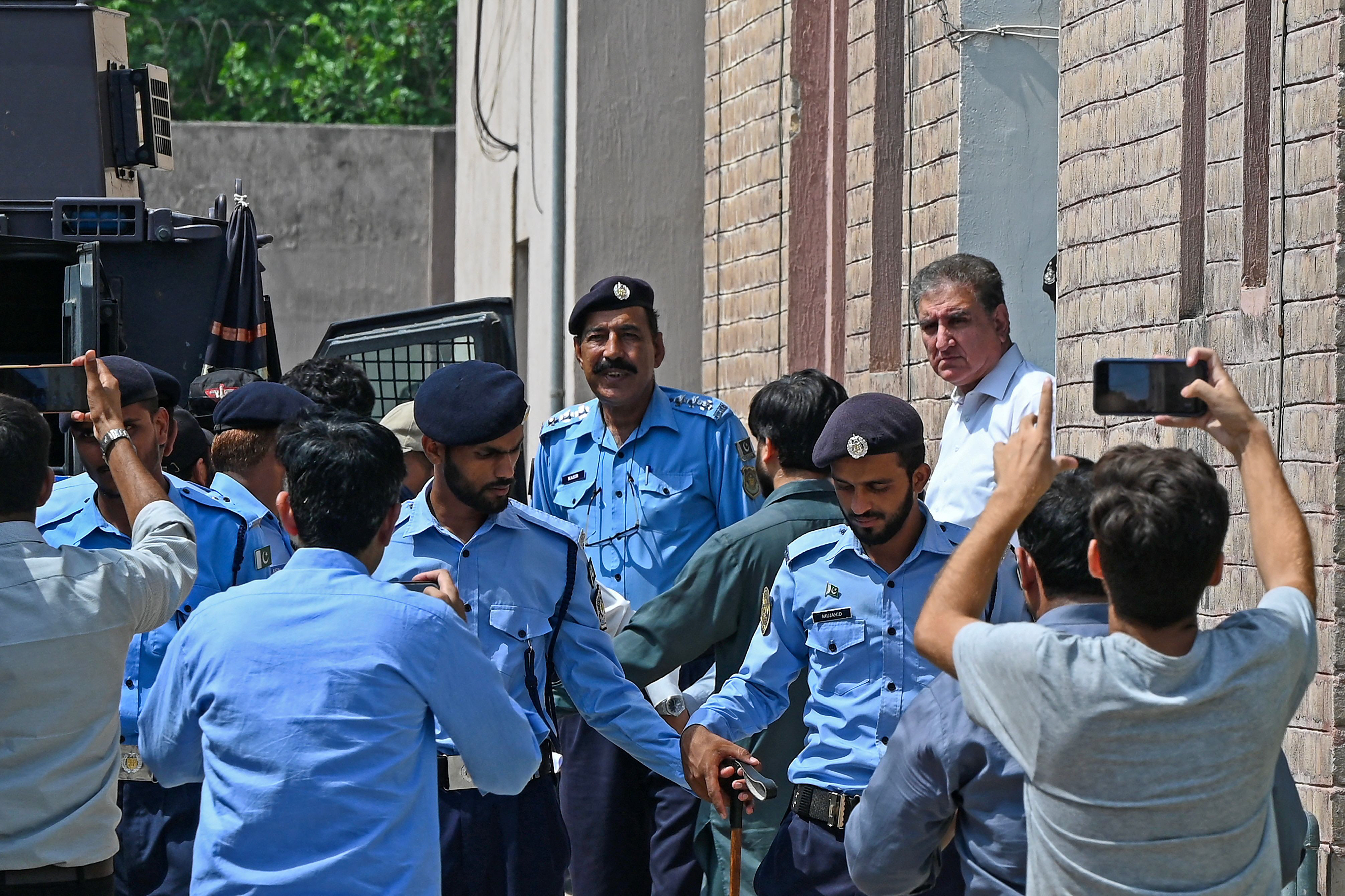 pti vice chairman shah mahmood qureshi is seen outside a special court in islamabad photo afp