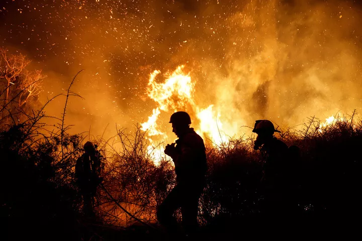 firefighters work to put out a fire in an open field following a mass infiltration by hamas gunmen from the gaza strip near a hospital in ashkelon southern israel october 7 2023 reuters firefighters work to put out a fire in an open field following a mass infiltration by hamas gunmen from the gaza strip near a hospital in ashkelon southern israel october 7 2023 reuters