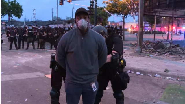 screengrab of cnn correspondent omar jimenez being arrested on live tv friday morning in minneapolis cnn