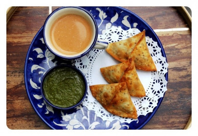 preparing for ramazan with potato stuffed samosas and a spoonful of green mango chutney