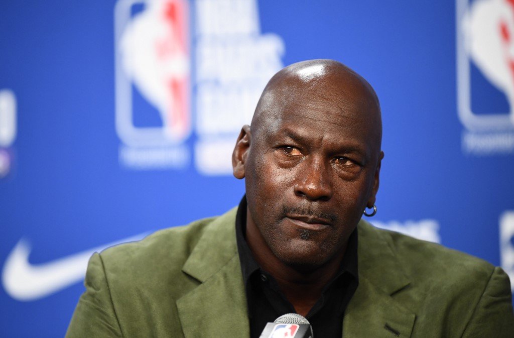 former nba star and owner of charlotte hornets team michael jordan looks on as he addresses a press conference ahead of the nba basketball match between milwaukee bucks and charlotte hornets at the accorhotels arena in paris on january 24 2020 photo by franck fife afp