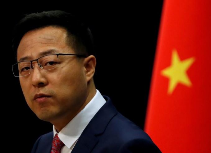 any words or actions by the us that harm china s interests will meet with china s firm counterattack chinese fm photo reuters