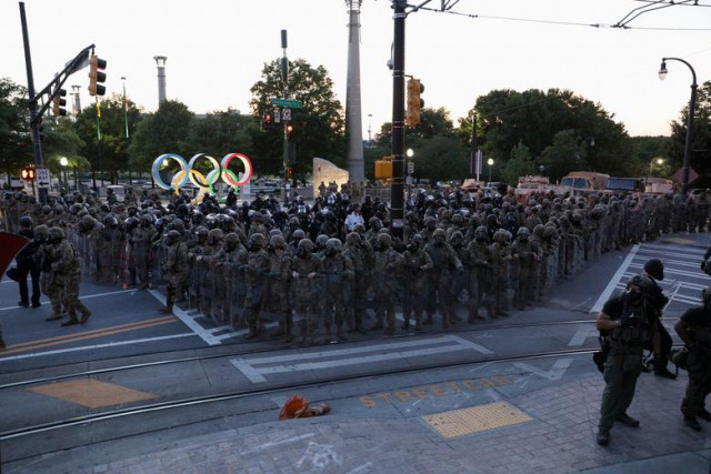 national guard personnel is seen during a protest near centennial olympic park in atlanta georgia u s on monday photo reuters national guard personnel is seen during a protest near centennial olympic park in atlanta georgia u s on monday photo reuters
