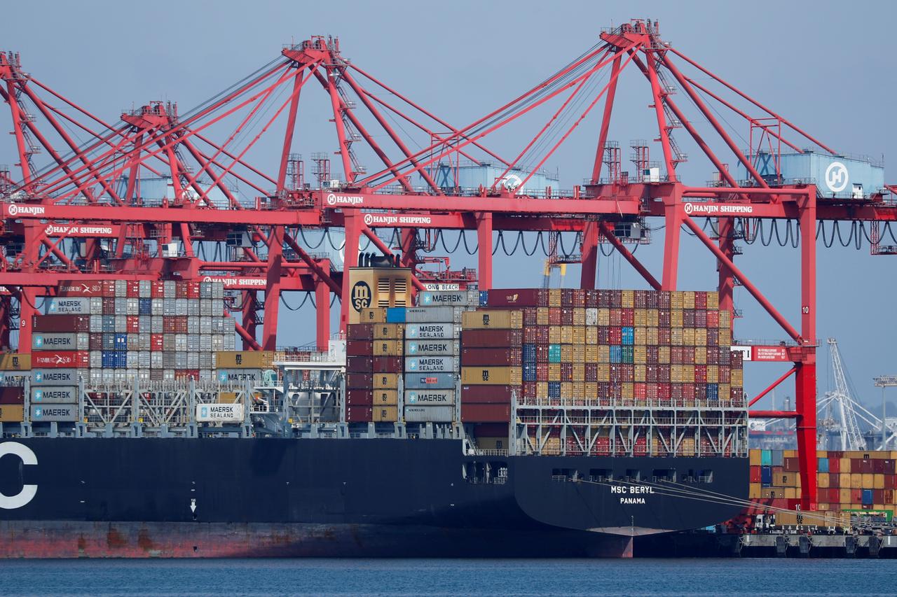 Trade Deficit Shrinks 35% To $1.46b