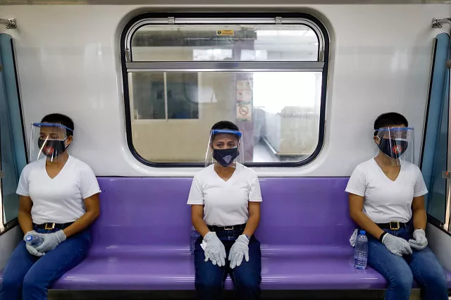 police trainees wearing personal protective equipment maintain social distancing in a train during a simulation exercise in preparation for the resumption of train operations amid the coronavirus disease covid 19 outbreak in manila philippines may 26 2020 photo reuters police trainees wearing personal protective equipment maintain social distancing in a train during a simulation exercise in preparation for the resumption of train operations amid the coronavirus disease covid 19 outbreak in manila philippines may 26 2020 photo reuters