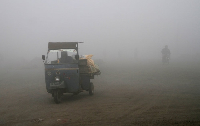 a man drives his rickshaw in heavy smog in lahore photo reuters a man drives his rickshaw in heavy smog in lahore photo reuters