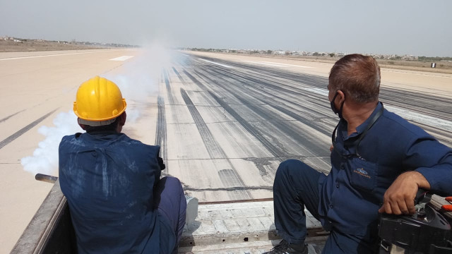 insecticide is sprayed on the runway to fend off locusts photo express courtesy caa insecticide is sprayed on the runway to fend off locusts photo express courtesy caa