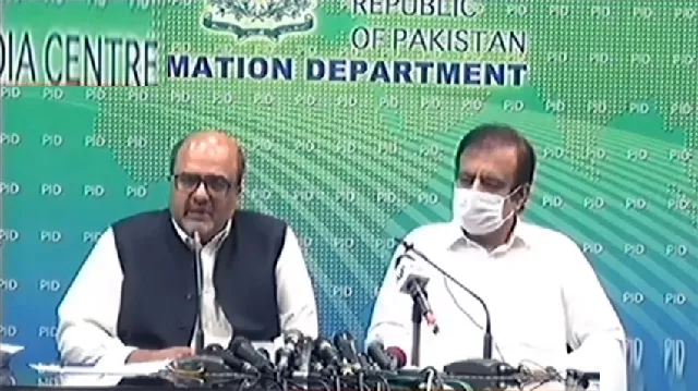 pm 039 s aide on accountability shahbzad akbar left and information minister shibli faraz address media in islamabad screengrab