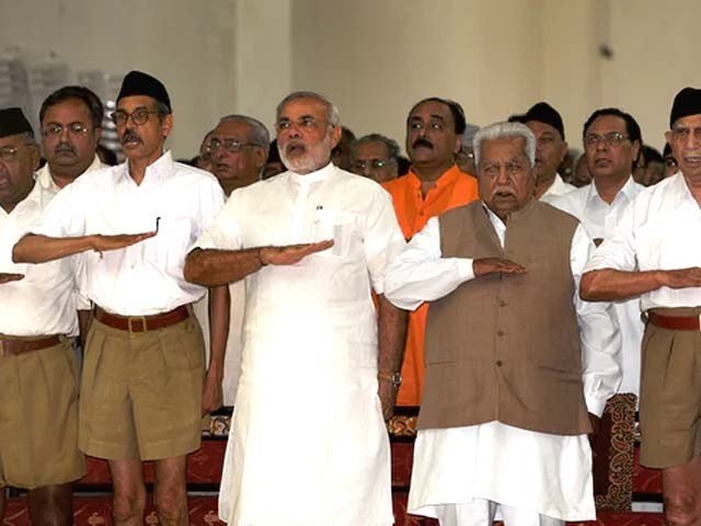 in this photograph taken in september 2009 narenda modi then chief minister of the western indian state of gujarat attends a rashtriya swayamsevak sangh rss gathering at tria mandir in adalaj near ahmedabad photo afp