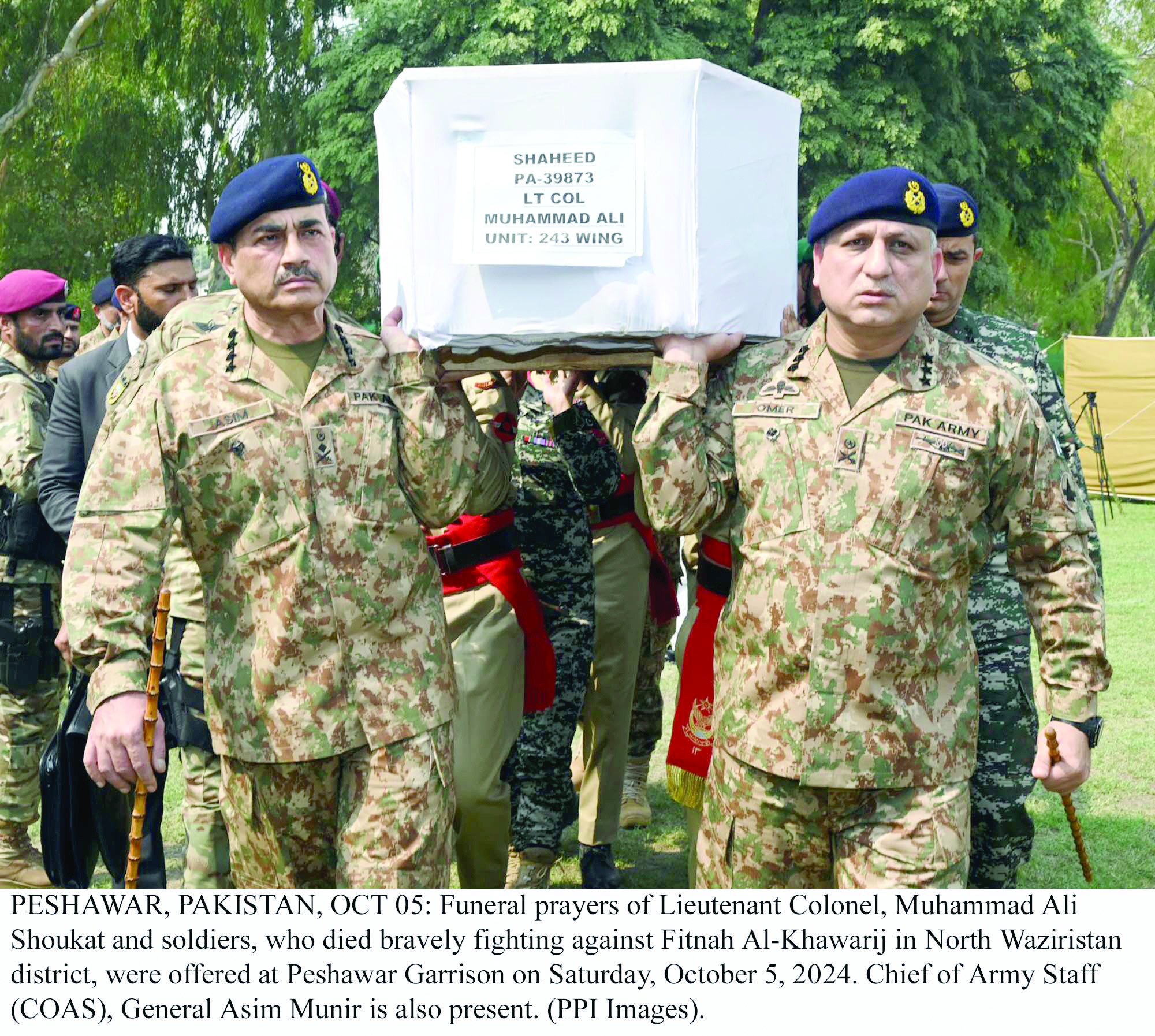 army chief gen syed asim munir and senior army officers carry the coffin of lieutenant colonel muhammad ali shoukat after attending his funeral prayers in peshawar on october 5 2024 photo ppi