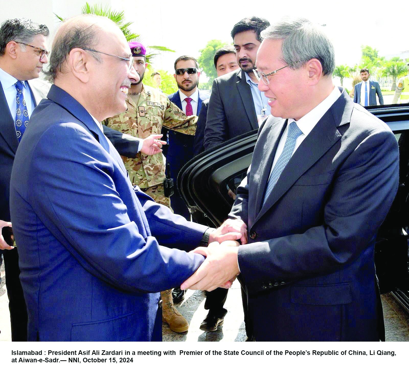 president asif zardari welcomes chinese premier li qiang at the aiwan e sadr photo nni