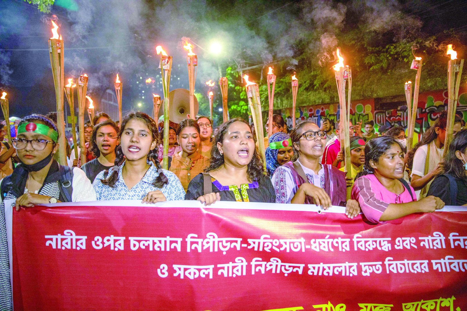 female students chant slogans during a protest in dhaka photo afp