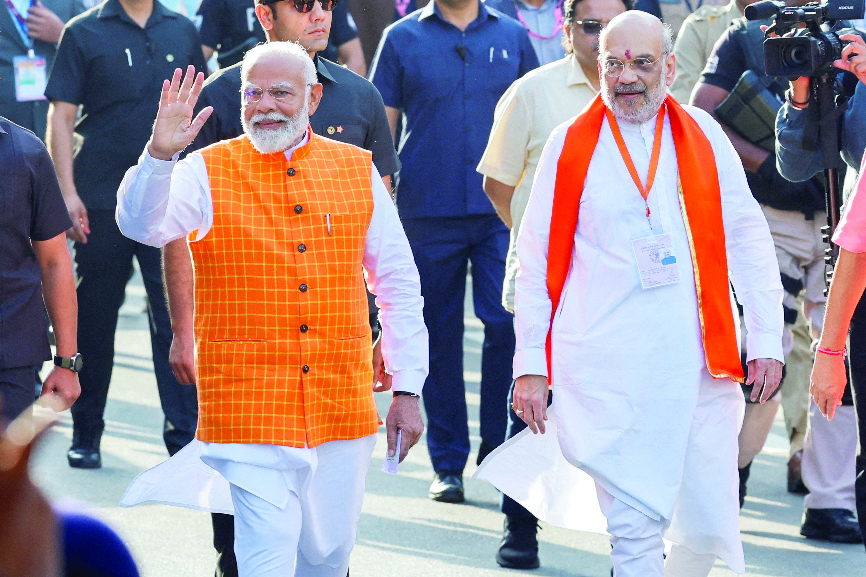 in this file photo india s pm narendra modi and amit shah indian home minister and leader of india s ruling bjp are seen coming to cast their votes in ahmedabad india photo reuters