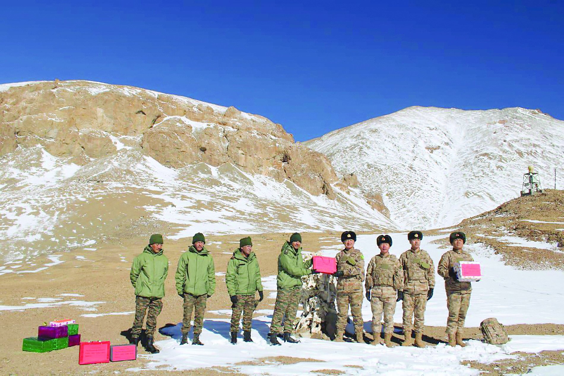 indian and chinese army greet each other along the line of actual control lac near karakoram pass in ladakh on the occasion of diwali photo afp