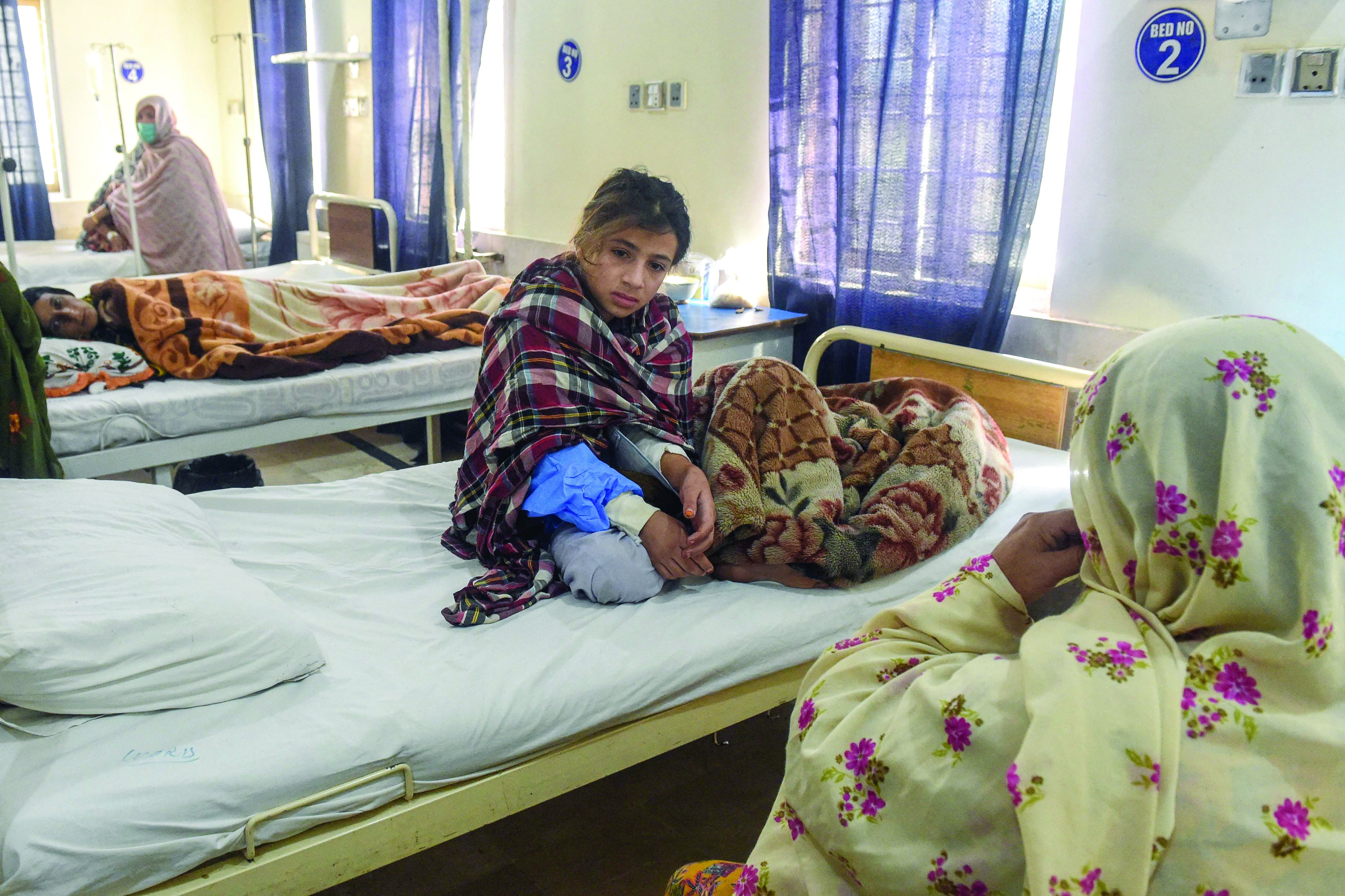 an injured student is seen inside a hospital in mastung photo afp