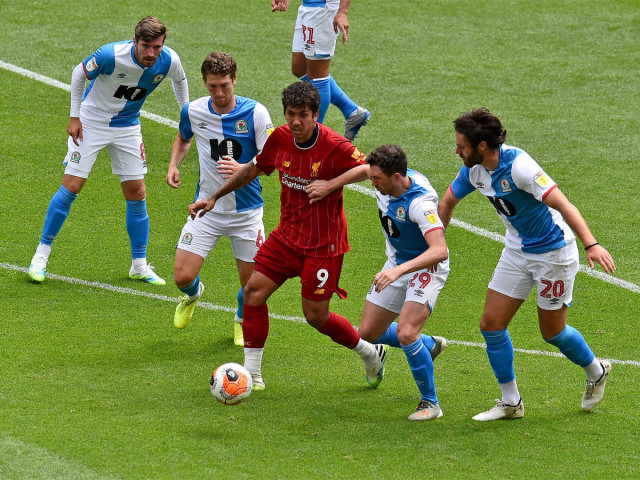 reds are 25 points clear at the top and on the verge of clinching their first league title in 30 years photo afp reds are 25 points clear at the top and on the verge of clinching their first league title in 30 years photo afp