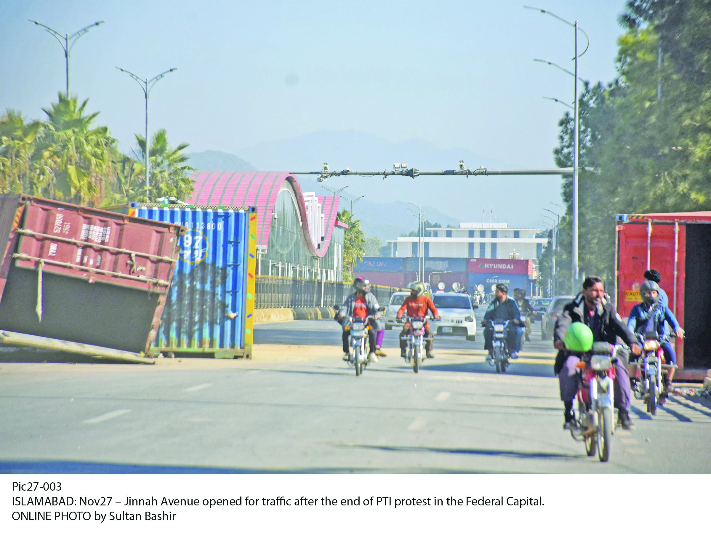 traffic moves smoothly on a road after the removal of containers in islamabad photo online