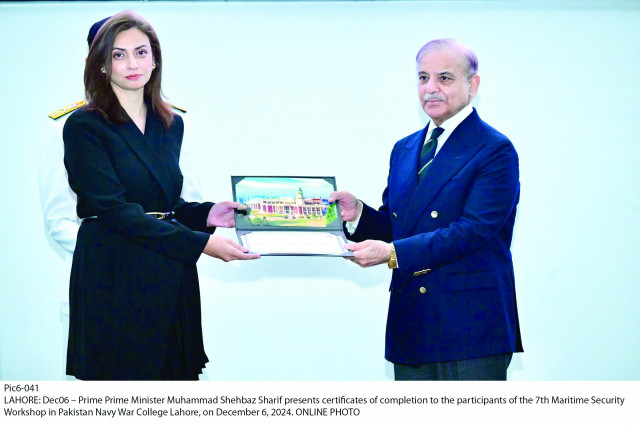 pm shehbaz sharif presents a certificate to a participant of the 7th maritime security workshop in lahore photo app pm shehbaz sharif presents a certificate to a participant of the 7th maritime security workshop in lahore photo app