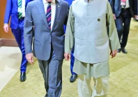 pm shehbaz sharif walks with bangladesh chief adviser dr muhammad yunis during a meeting on the sidelines of the d 8 summit in cairo photo nni