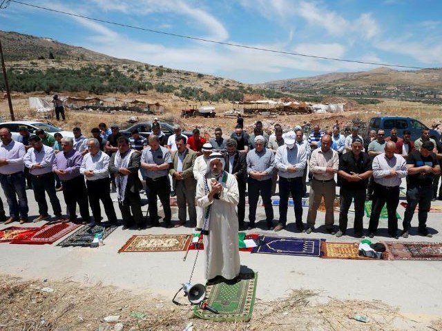 palestinians attend friday prayers during a protest against israel 039 s plan to annex parts of the occupied west bank in beta village near nablus june 12 2020 photo reuters