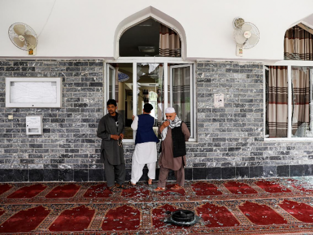 men inspect the site of a blast inside a mosque in kabul afghanistan june 12 photo reuters men inspect the site of a blast inside a mosque in kabul afghanistan june 12 photo reuters
