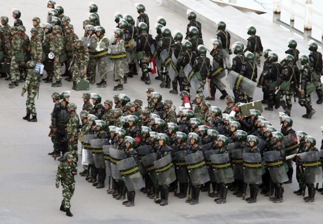 china s top police official vows crackdown on terrorism