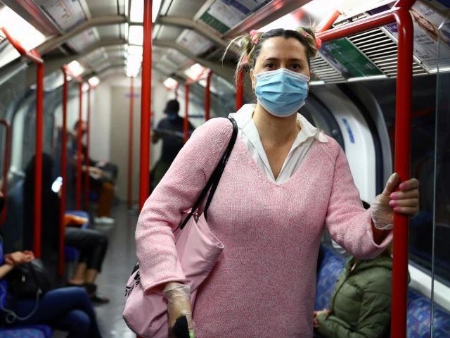 a passenger wearing a face mask travels on the central line tube amid the spread of the coronavirus disease covid 19 in london britain june 15 2020 photo reuters file