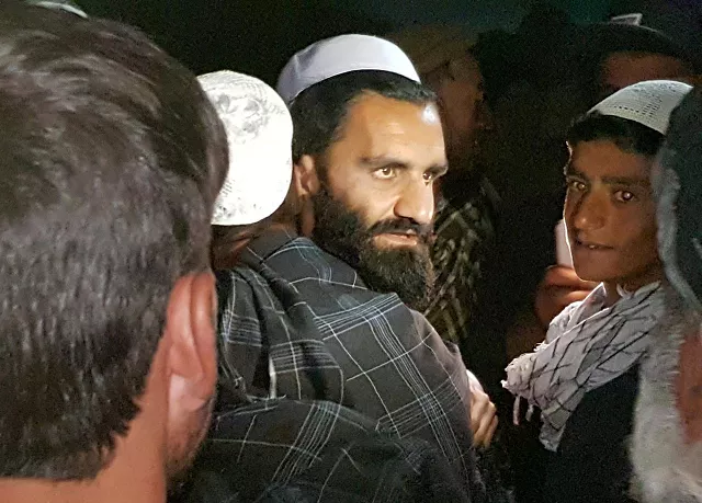 a newly freed taliban prisoner hugs his relatives outside bagram prison photo reuters file a newly freed taliban prisoner hugs his relatives outside bagram prison photo reuters file