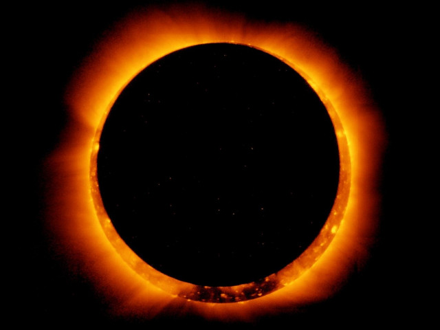 sun spots are seen as the moon moves into a full eclipse position photo online sun spots are seen as the moon moves into a full eclipse position photo online