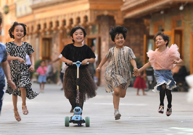 children have fun in the quot dove lane quot in the old town tuancheng of hotan city northwest china 039 s xinjiang uygur autonomous region may 27 2020 photo xinhua