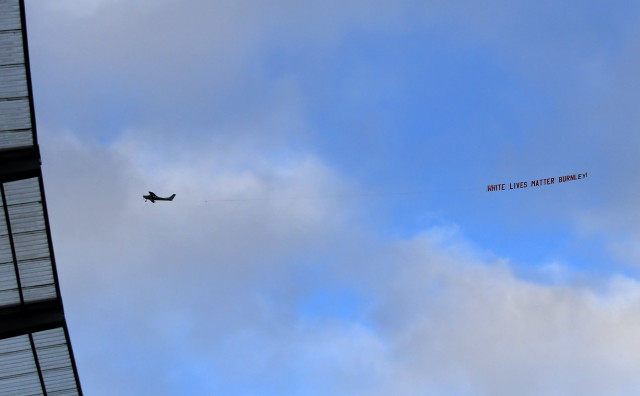 the plane appeared shortly after players from both teams took a knee in support of the black lives matter movement photo reuters the plane appeared shortly after players from both teams took a knee in support of the black lives matter movement photo reuters