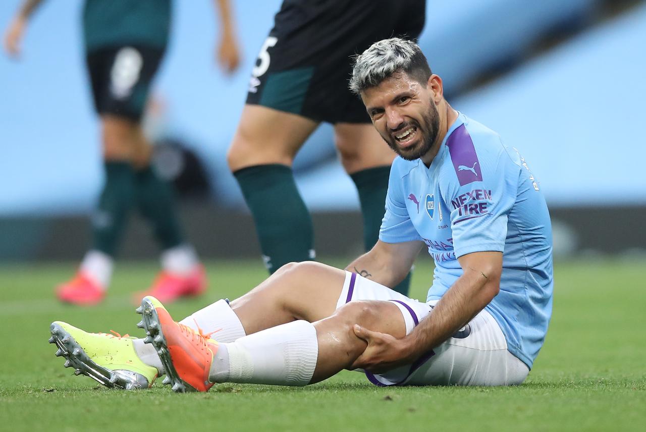 argentine star went down under a challenge from defender ben mee on the stroke of halftime against burnley photo reuters