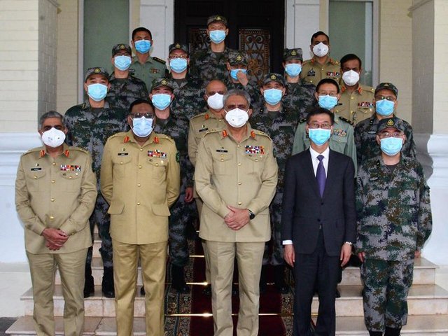 a 10 member people s liberation army pla medical team led by major general doctor zhou feihu chief of icu department pla general hospital meets coas gen qamar javed bajwa at the ghq photo ispr