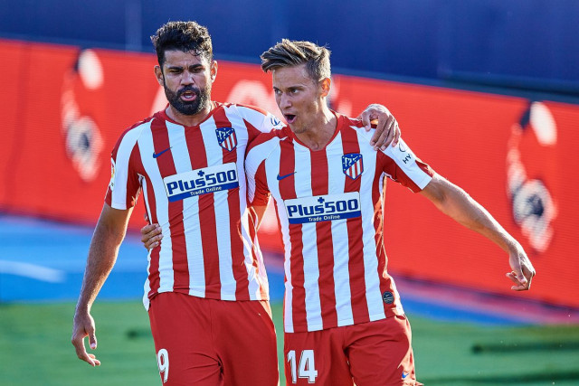 simeone 039 s side saw out the victory to tighten their grip on third place by moving two points above sevilla photo reuters