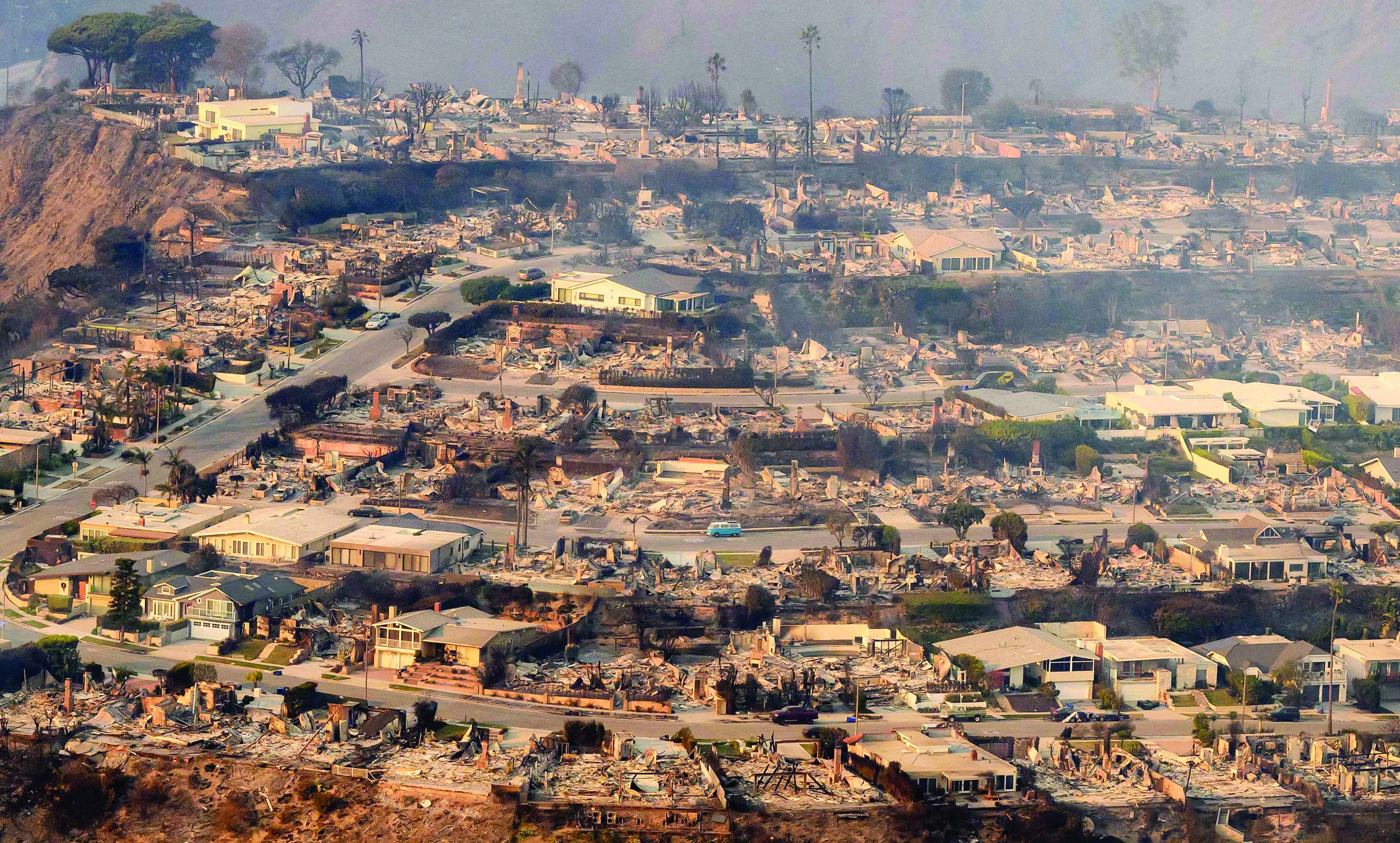 in this aerial view taken from a helicopter burned homes are seen from above in los angeles photo afp