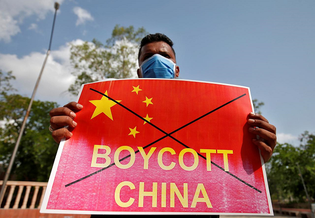 a member of national students 039 union of india nsui holds a placard during a protest against china in ahmedabad june 18 2020 photo reuters a member of national students 039 union of india nsui holds a placard during a protest against china in ahmedabad june 18 2020 photo reuters