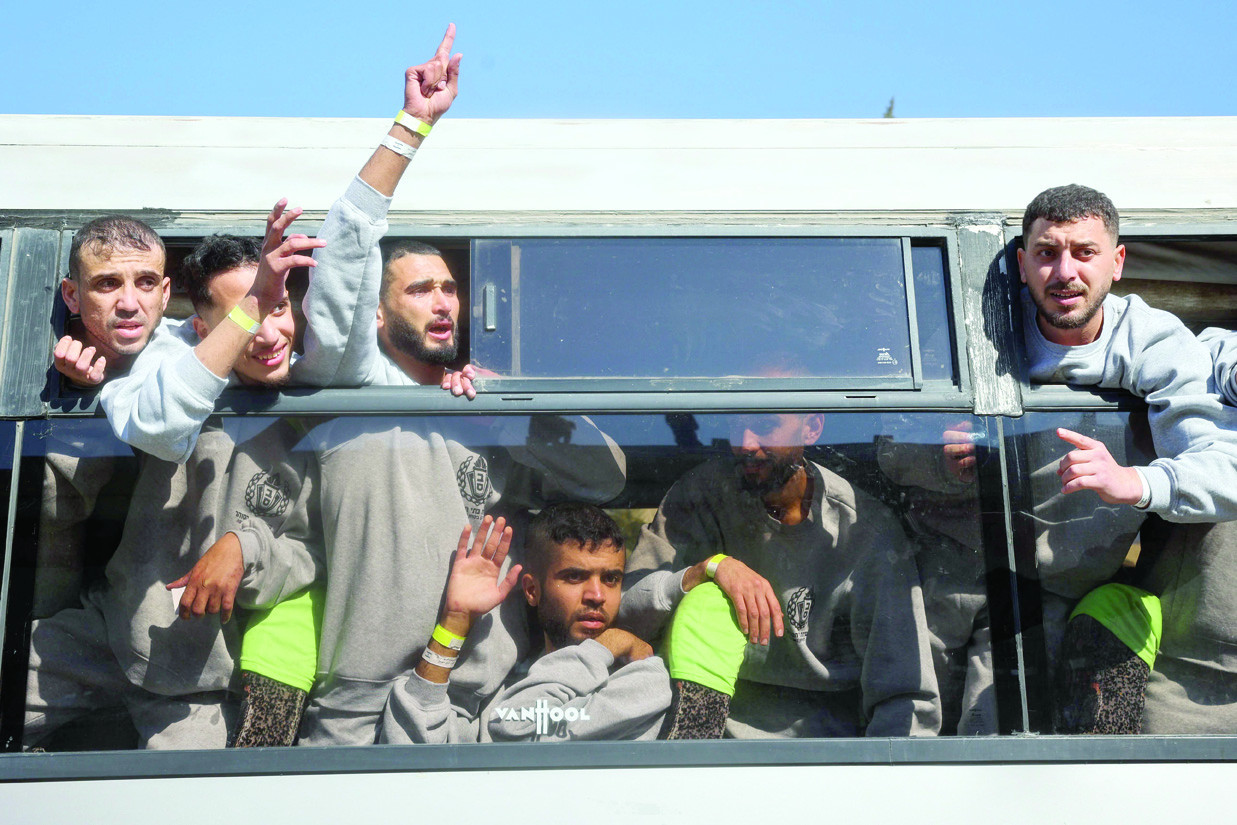 palestinians who were imprisoned by israel arrive on buses to the european hospital in khan yunis for check ups following their release photo afp