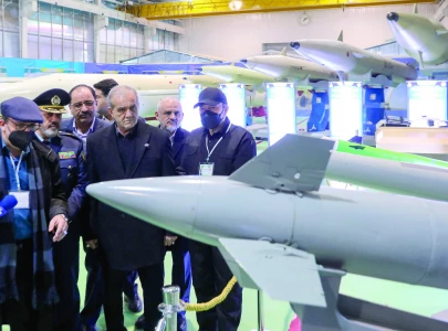 iran unveils new ballistic missile in show of force