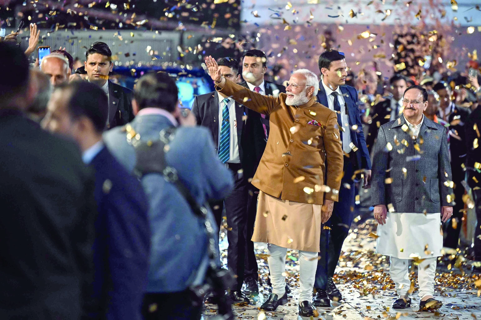 india s prime minister narendra modi waves to supporters as he arrives at the bharatiya janata party bjp headquarters to celebrate the party s win in the delhi legislative assembly election in new delhi photo afp india s prime minister narendra modi waves to supporters as he arrives at the bharatiya janata party bjp headquarters to celebrate the party s win in the delhi legislative assembly election in new delhi photo afp