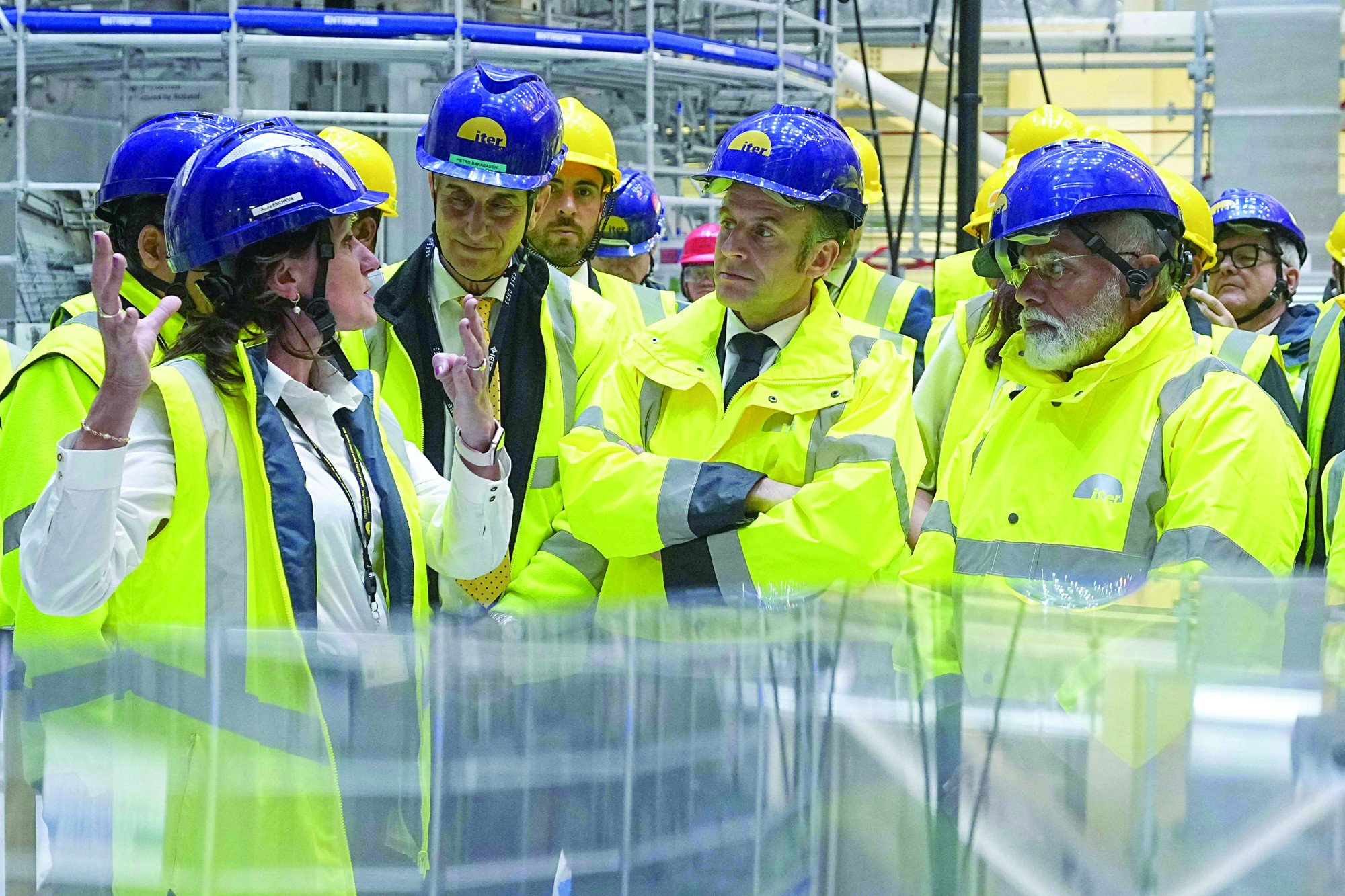 french president emmanuel macron and indian prime minister narendra modi visit the iter international thermonuclear experimental reactor in saint paul les durance near marseille southern france photo afp