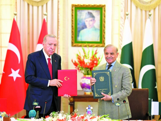 prime minister shehbaz sharif and turkey s president recep tayyip erdogan hold documents of joint declaration at the prime minister house in islamabad photo afp prime minister shehbaz sharif and turkey s president recep tayyip erdogan hold documents of joint declaration at the prime minister house in islamabad photo afp
