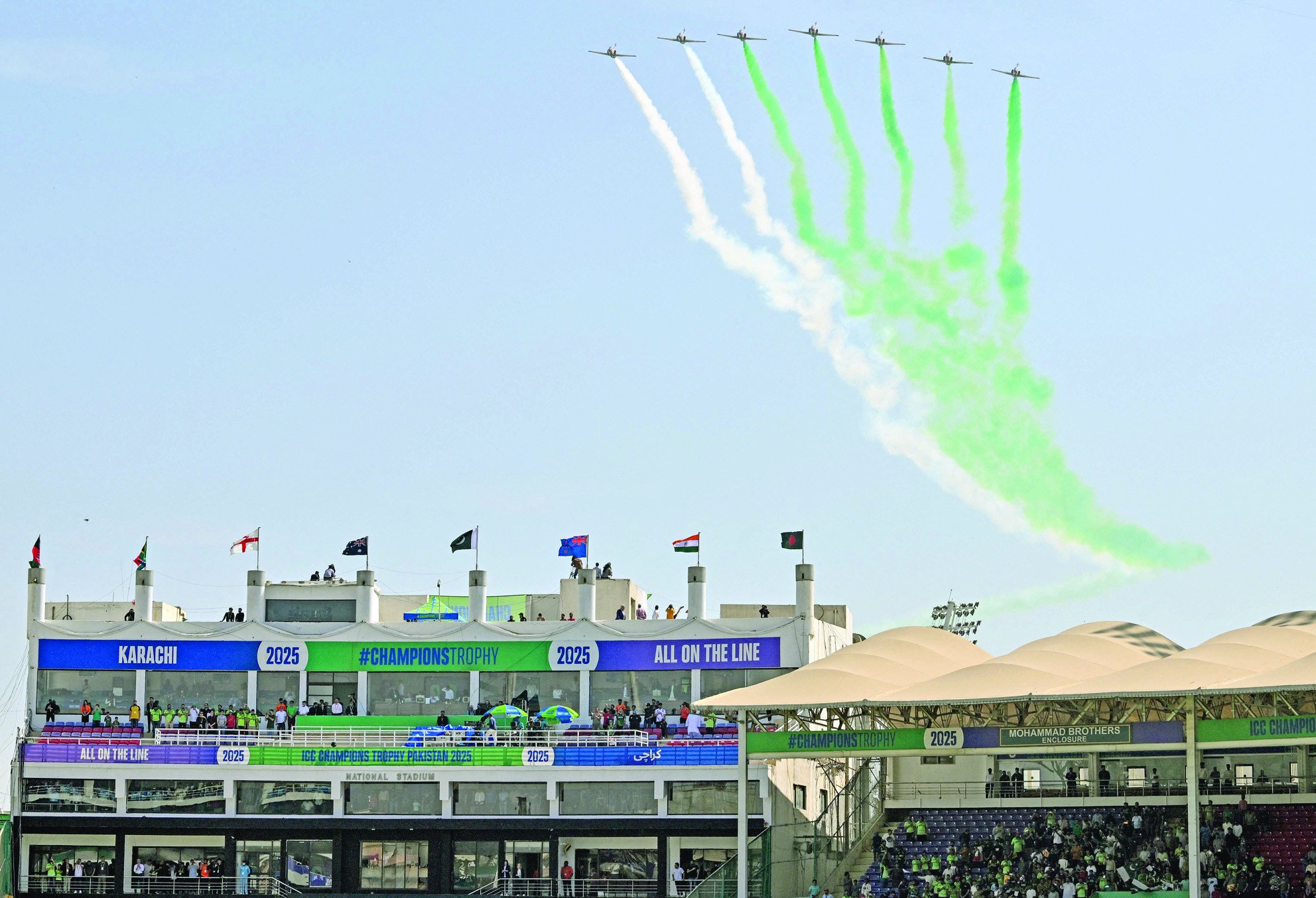 pakistan air force sherdils fly past at the opening ceremony of the icc champions trophy odi cricket match between pakistan and new zealand at national bank stadium in karachi photo afp