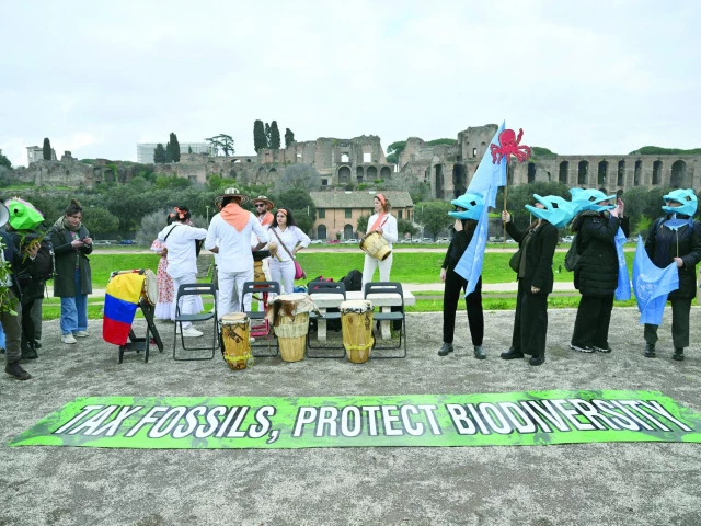 environmental activists take part in a flasmob at circo massimo at the un s food and agriculture organization headquarters in rome photo afp environmental activists take part in a flasmob at circo massimo at the un s food and agriculture organization headquarters in rome photo afp