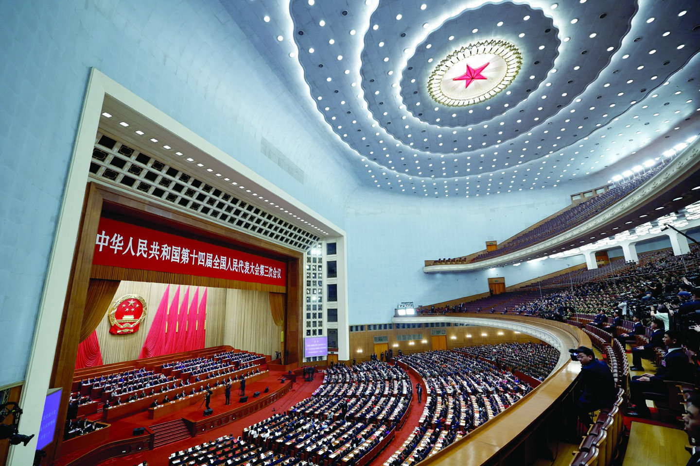 delegates attend the closing session of the npc at the great hall of the people in beijing photo reuters