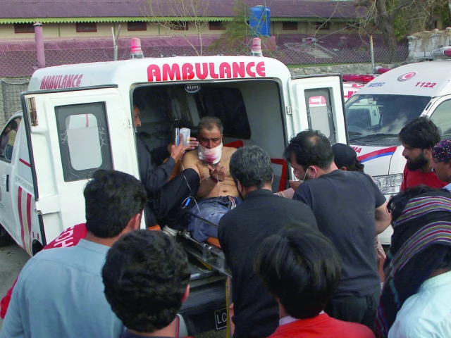 an injured man sits in an ambulance at mach railway station in balochistan photo reuters an injured man sits in an ambulance at mach railway station in balochistan photo reuters