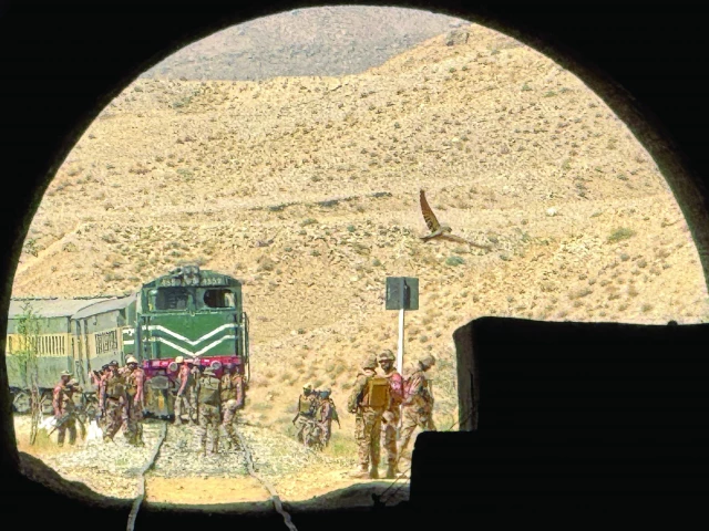 frontier corps troops inspect the siege site of jaffar express in a remote mountainous area of pehro kunri in balochistan photo afp frontier corps troops inspect the siege site of jaffar express in a remote mountainous area of pehro kunri in balochistan photo afp