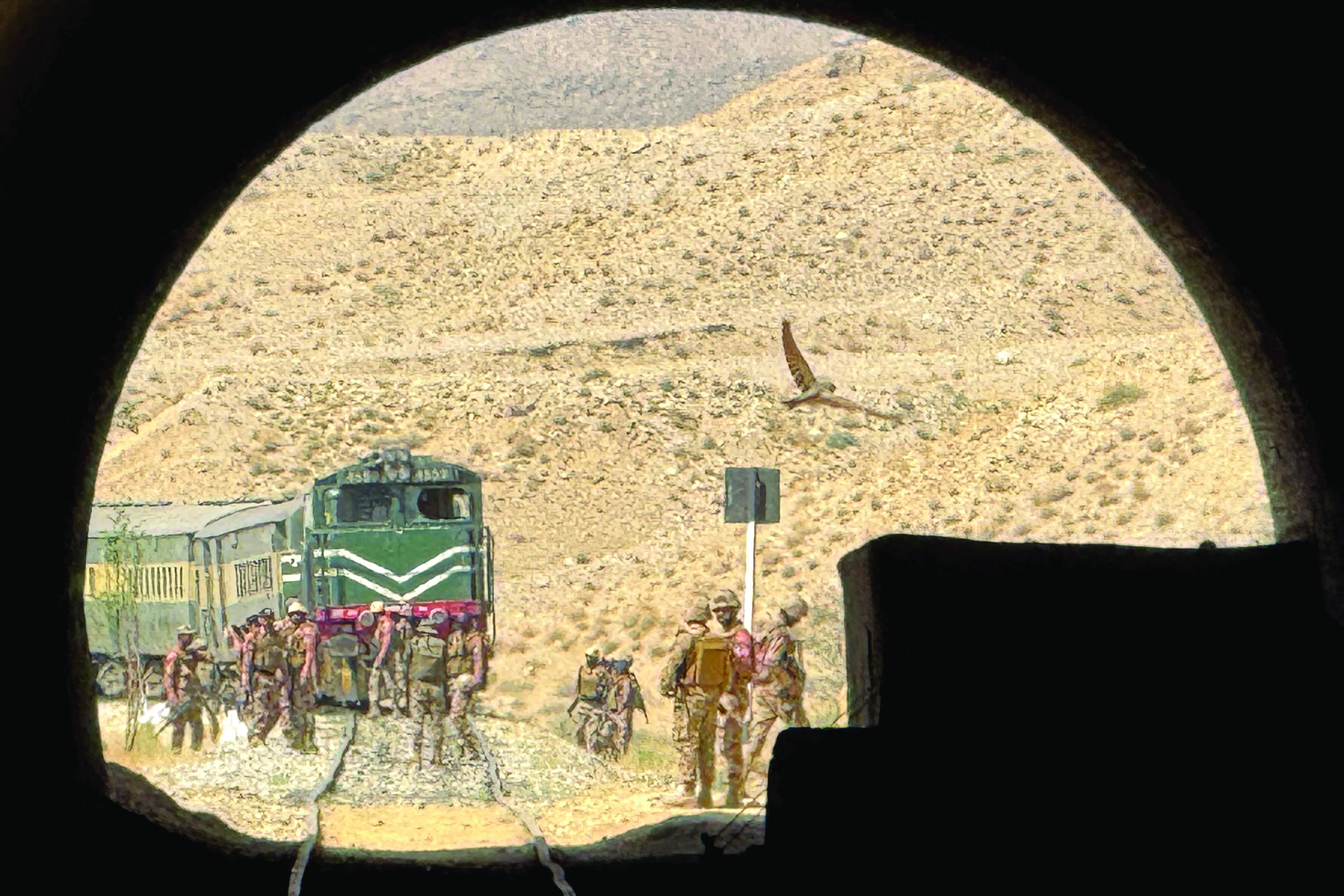 frontier corps troops inspect the siege site of jaffar express in a remote mountainous area of pehro kunri in balochistan photo afp