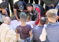 people mourns the death of one of the victims of israeli bombardment in beit lahia gaza strip photo afp