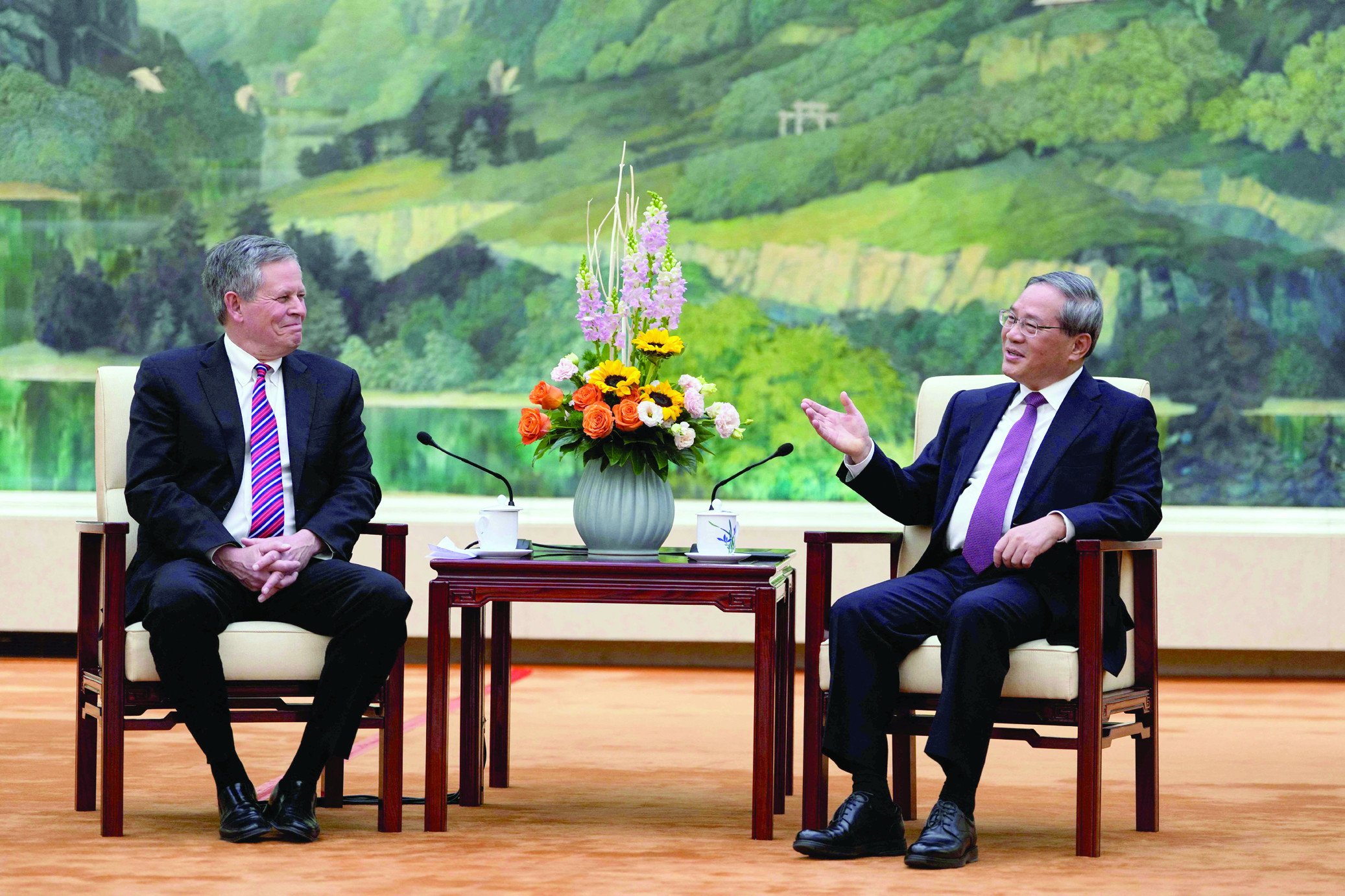 chinese premier li qiang meets us senator steve daines in the fujian room at the great hall of the people in beijing photo afp